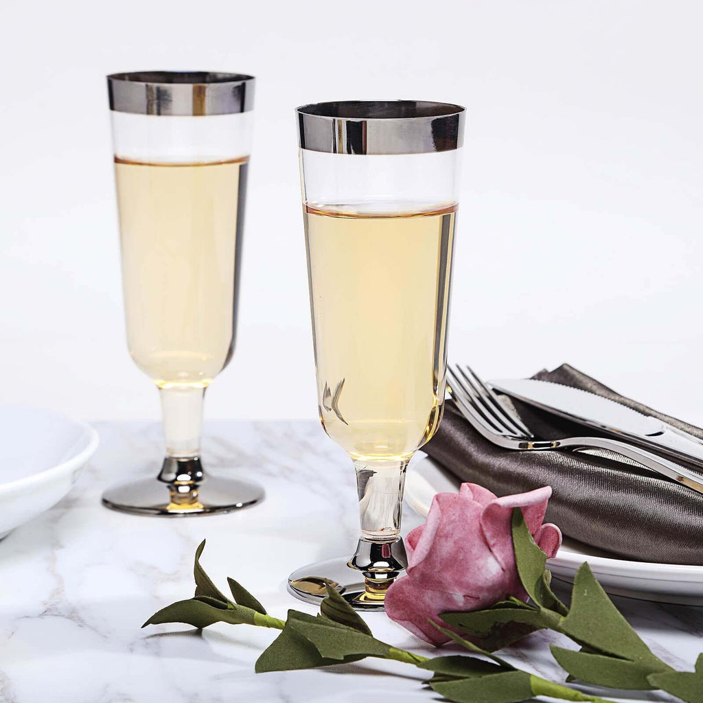 http://www.efavormart.com/cdn/shop/products/Chrome-Silver-Rim-Clear-Plastic-Champagne-Glasses_1024x1024.jpg?v=1689405135