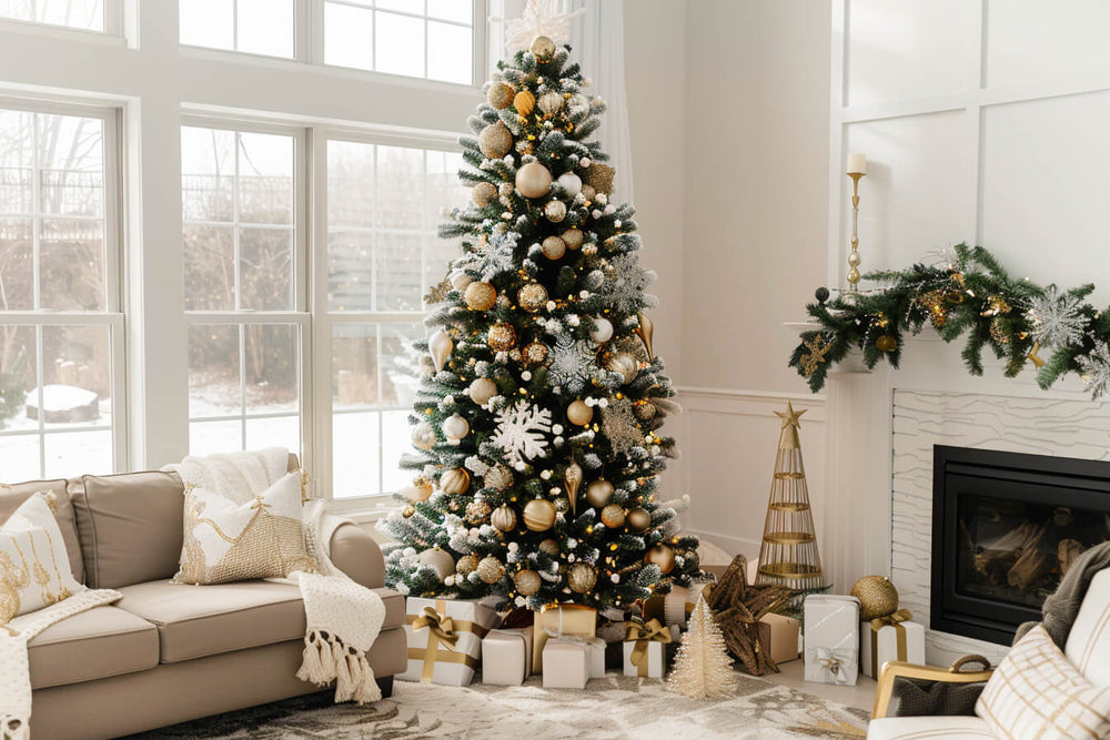 Elegant Christmas tree decorating ideas with gold and white ornaments in a cozy, modern living room setting.