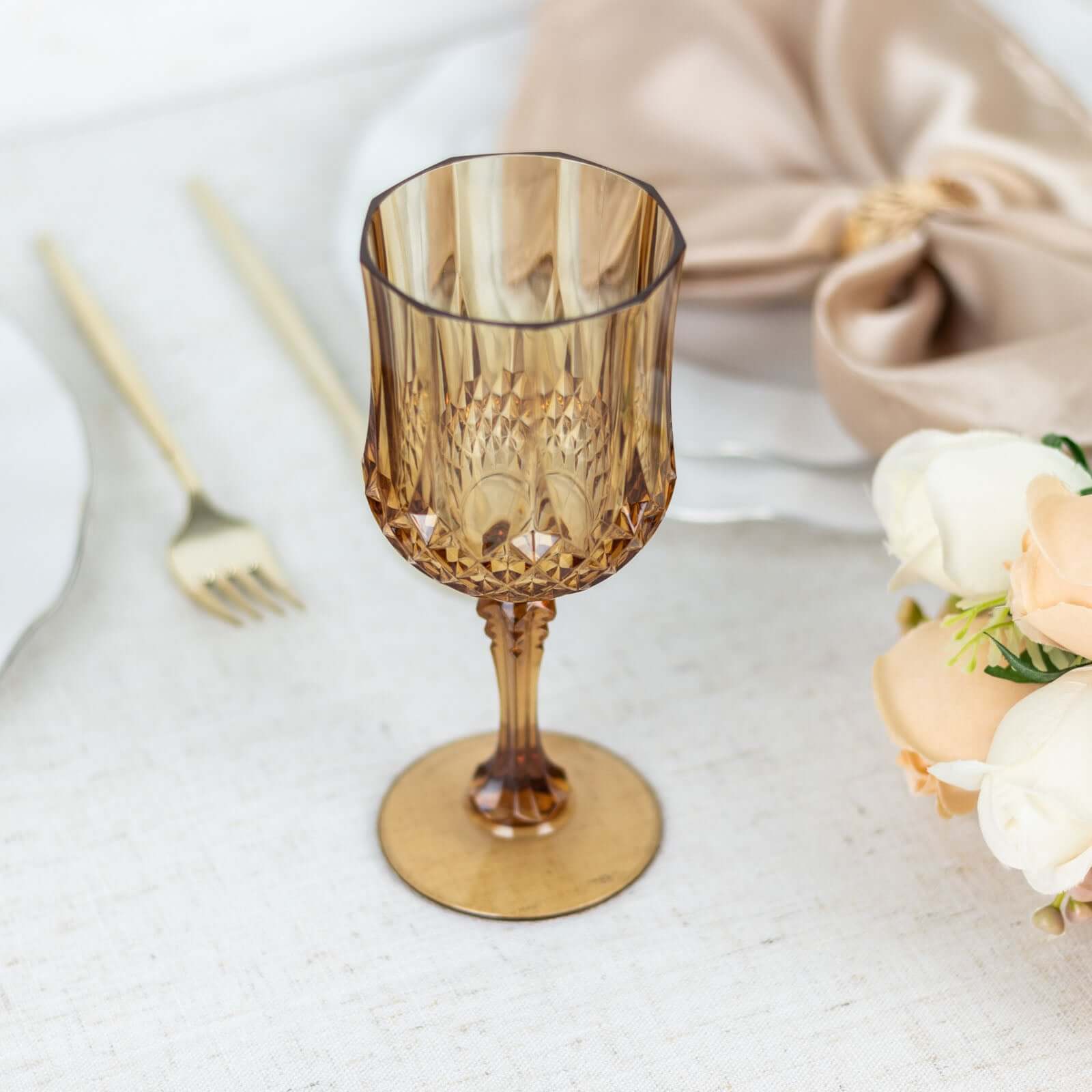 https://www.efavormart.com/cdn/shop/files/8oz_Amber_Crystal_Cut_Reusable_Plastic_Wine_Glasses_Shatterproof_Cocktail_Goblets_6_Pack_92b85cd3-7bd6-4228-8858-c860ce96eb1f.jpg