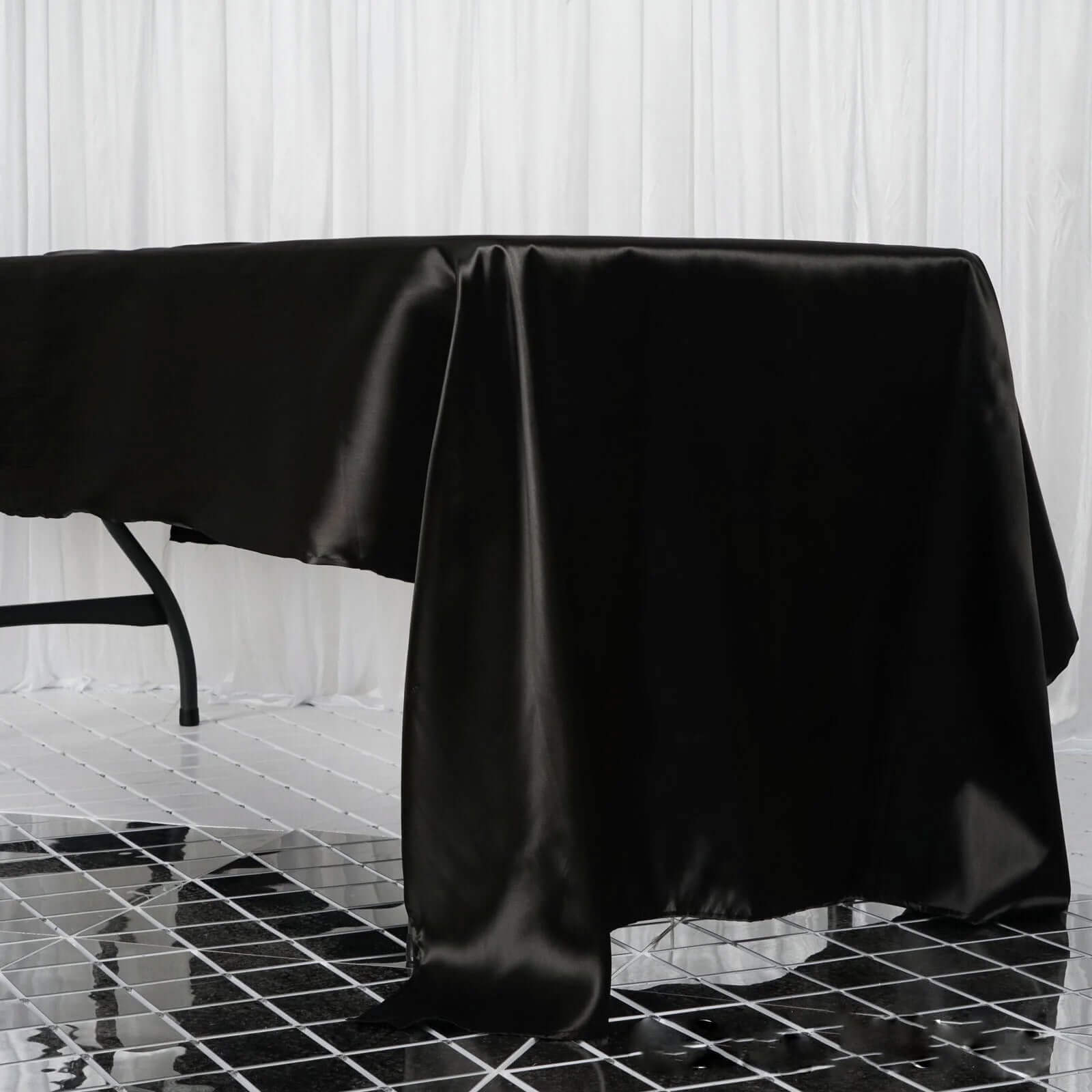 60x126 In Black Seamless Satin Rectangular Tablecloth | EFavormart.com