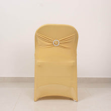 Champagne Spandex Folding Slip On Chair Covers with Silver Rhinestone Buckled Sash Band