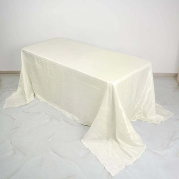 Ivory Accordion Crinkle Taffeta Seamless Rectangular Tablecloth 90"x132" for 6 Foot Table With Floor-Length Drop