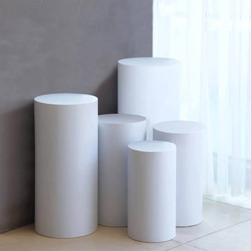 Set of 5 White Metal Cylinder Pillar Prop Stands For Wedding Aisle, Round Plinth Pedestal Display Boxes - 20", 22", 24", 30", 34"