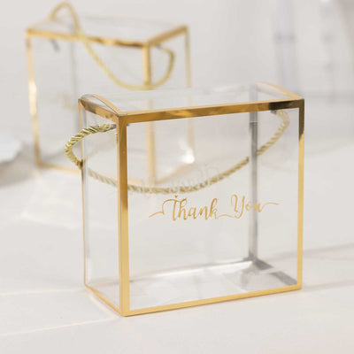 25 Pack Gold Trimmed Clear PVC Favor Boxes with Rope Handles and Thank You Print, Transparent Portable Candy Gift Boxes - 5.5"x5.5"