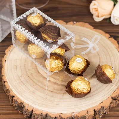 25 Pack Clear Rectangle Party Favor Boxes With Bowknot and White Lace Pattern, 4" Transparent Plastic Candy Gift Boxes - 2"x2"x4"