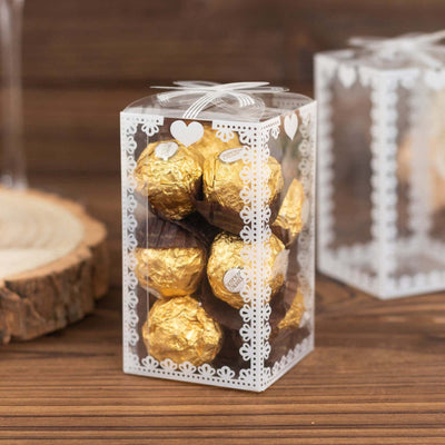 25 Pack Clear Rectangle Party Favor Boxes With Bowknot and White Lace Pattern, 4" Transparent Plastic Candy Gift Boxes - 2"x2"x4"
