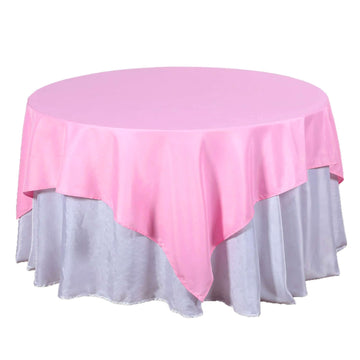 Create a Chic and Elegant Atmosphere with the Pink Square Seamless Polyester Table Overlay 70"x70"