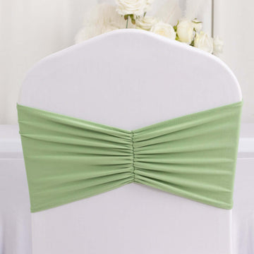 <span style="background-color:transparent;color:#000000;">Unmatched Elegance With Sage Green Ruffled Spandex Chair Sash Bands</span>