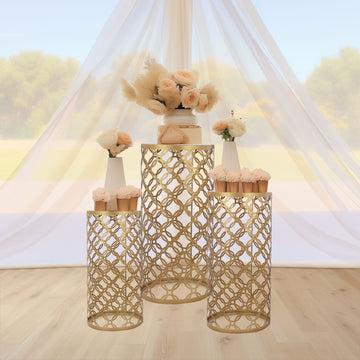 Set of 3 Gold Metal Cylinder Plinth Pedestal Stands, Round Mesh Pillar Cake Display Stand in Hollow Overlapping Circles Pattern - 22",24",30"