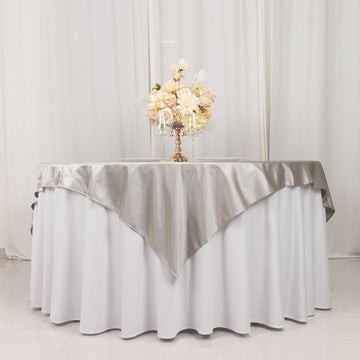 <strong>Shimmering Silver Premium Square Scuba Table Overlay: Elevate Your Event</strong>