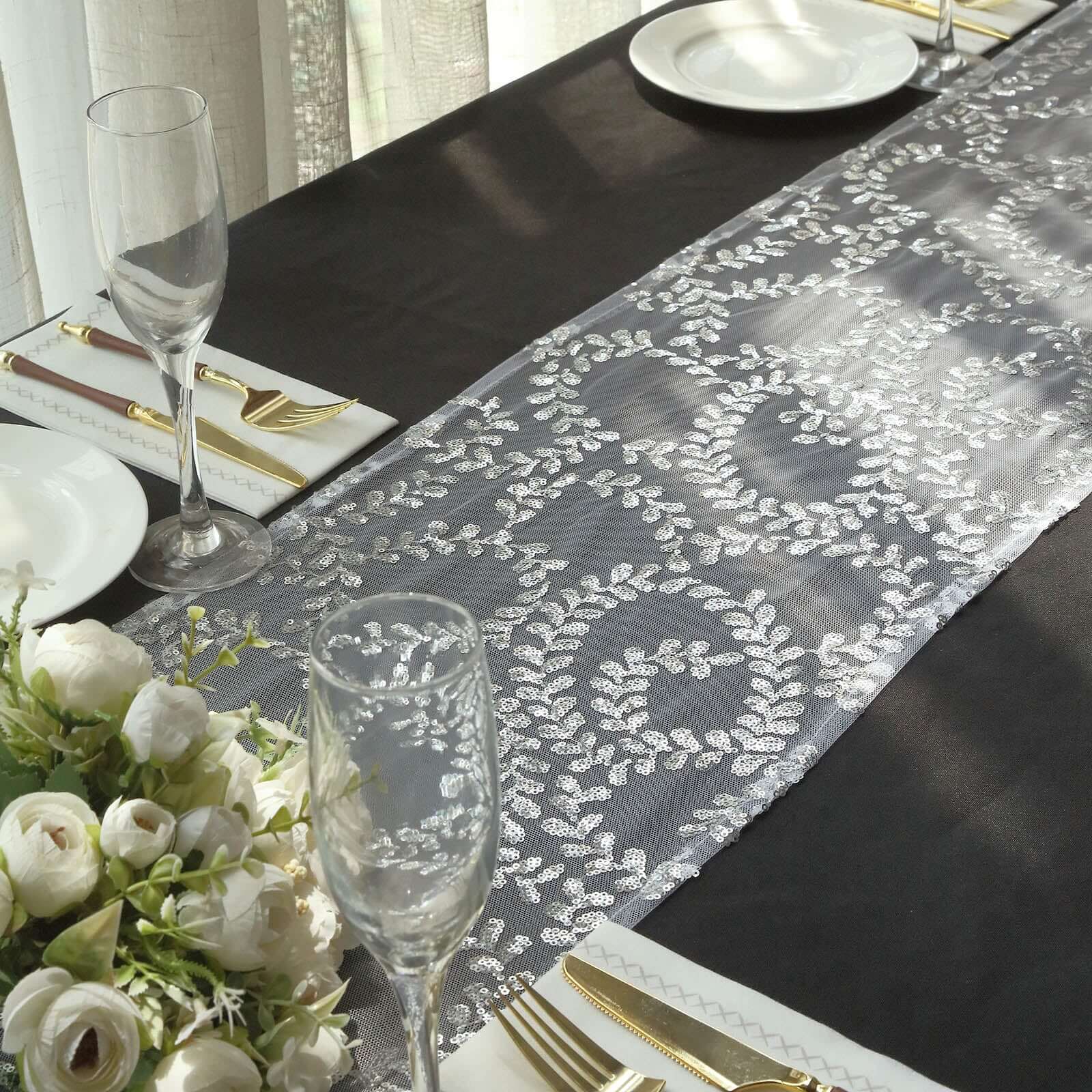 https://www.efavormart.com/cdn/shop/files/Silver-Leaf-Vine-Embroidered-Sequin-Mesh-Like-Table-Runner.jpg?v=1689408496