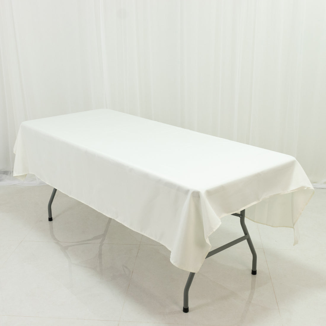 Ivory Polyester Rectangle Tablecloth 60×84 – Wrinkle-Resistant, Durable Party / Event Table Cover