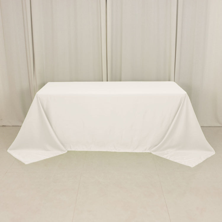 Ivory Seamless Lamour Satin Rectangle Tablecloth - 90x132inch for 6 Foot Table Floor-Length