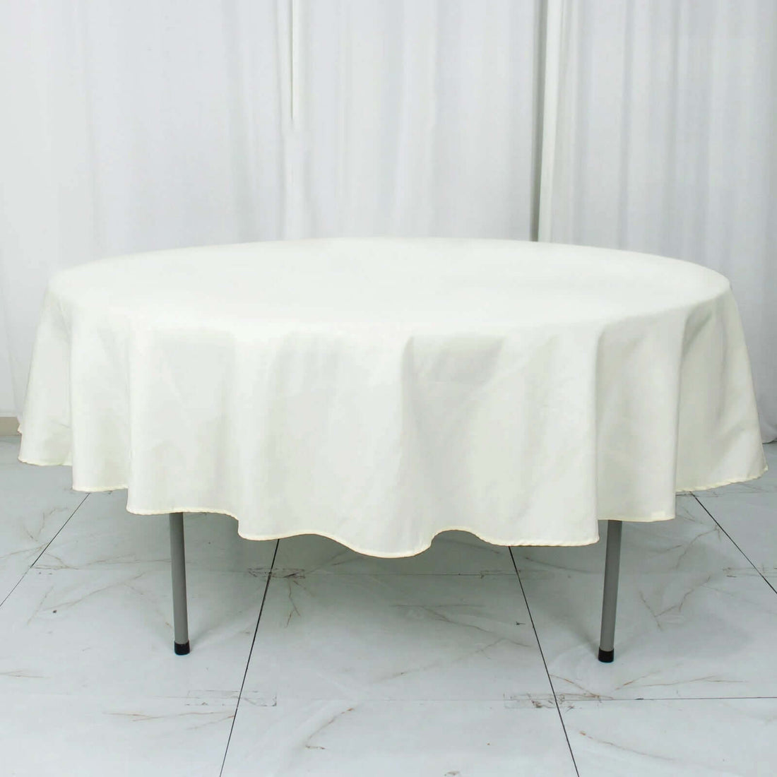 Round 90 Inch Ivory Seamless Premium 190 GSM Polyester Tablecloth