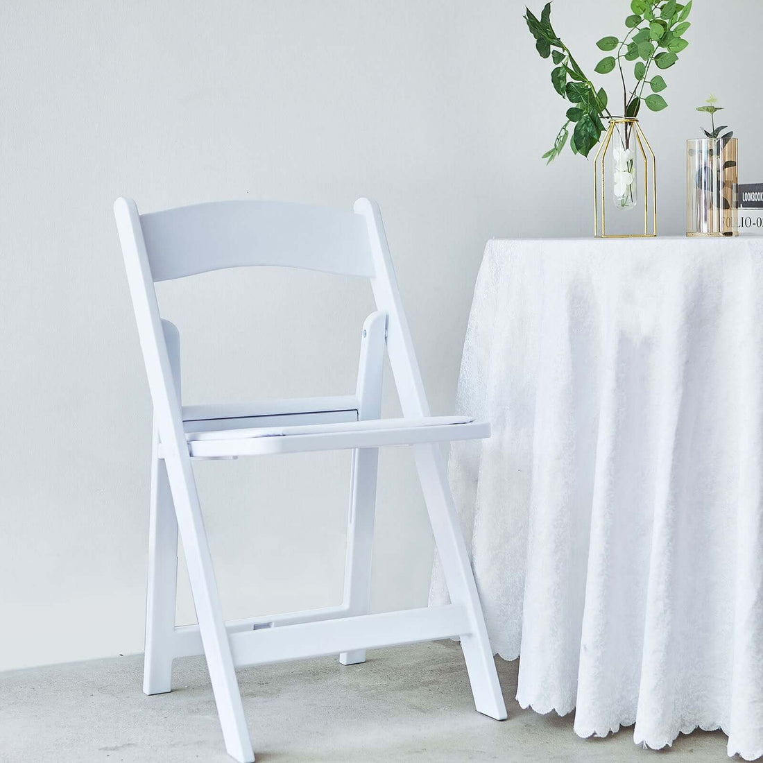 White Resin Folding Chair With Vinyl Padded Seat For Weddings, Indoor or Outdoor