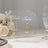 Wedding Table Numbers 1-10 – Clear Arch Acrylic with Gold Print & Stands for Elegant Receptions