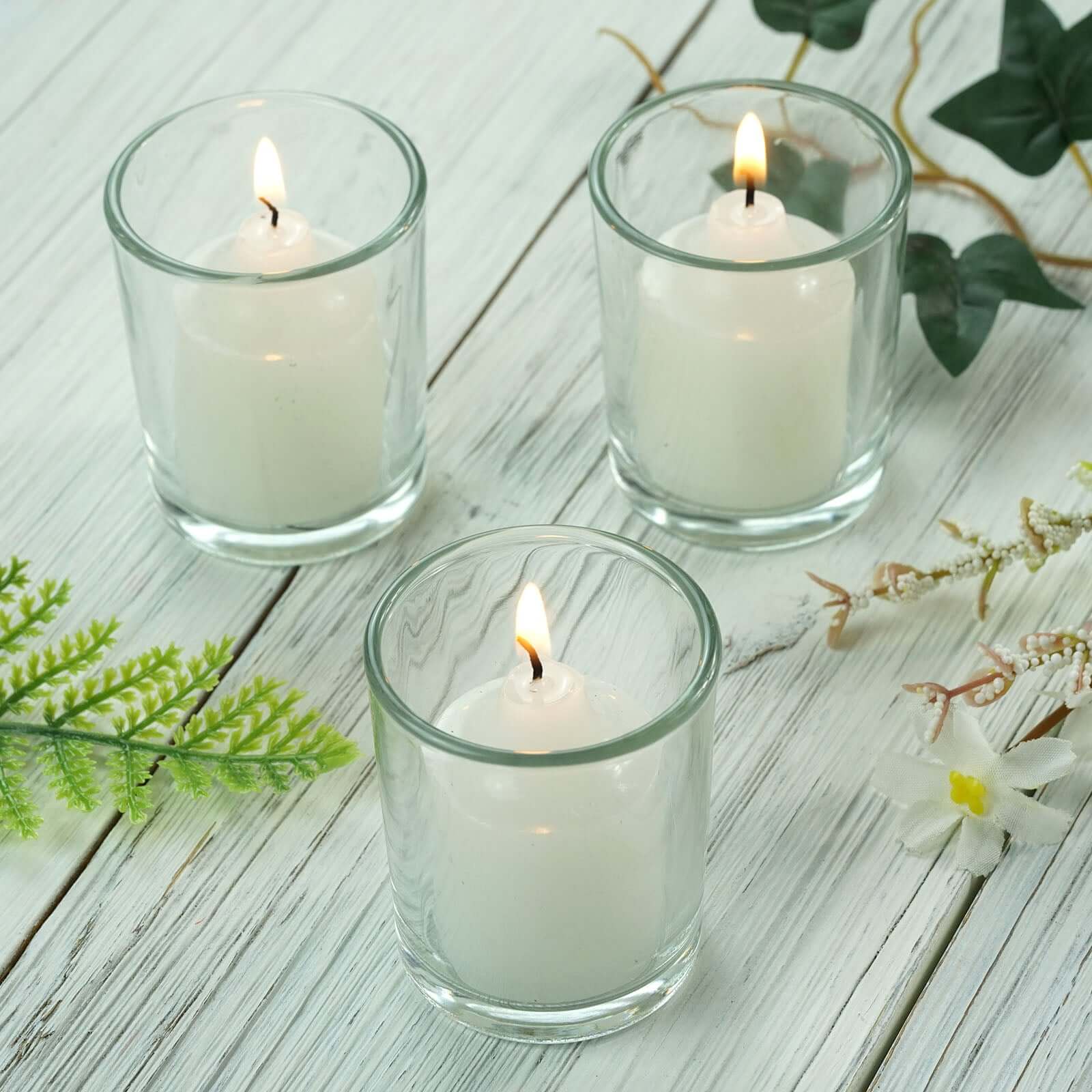 https://www.efavormart.com/cdn/shop/products/Clear-Glass-Votive-Candle-Holder-Set.jpg?v=1689405418