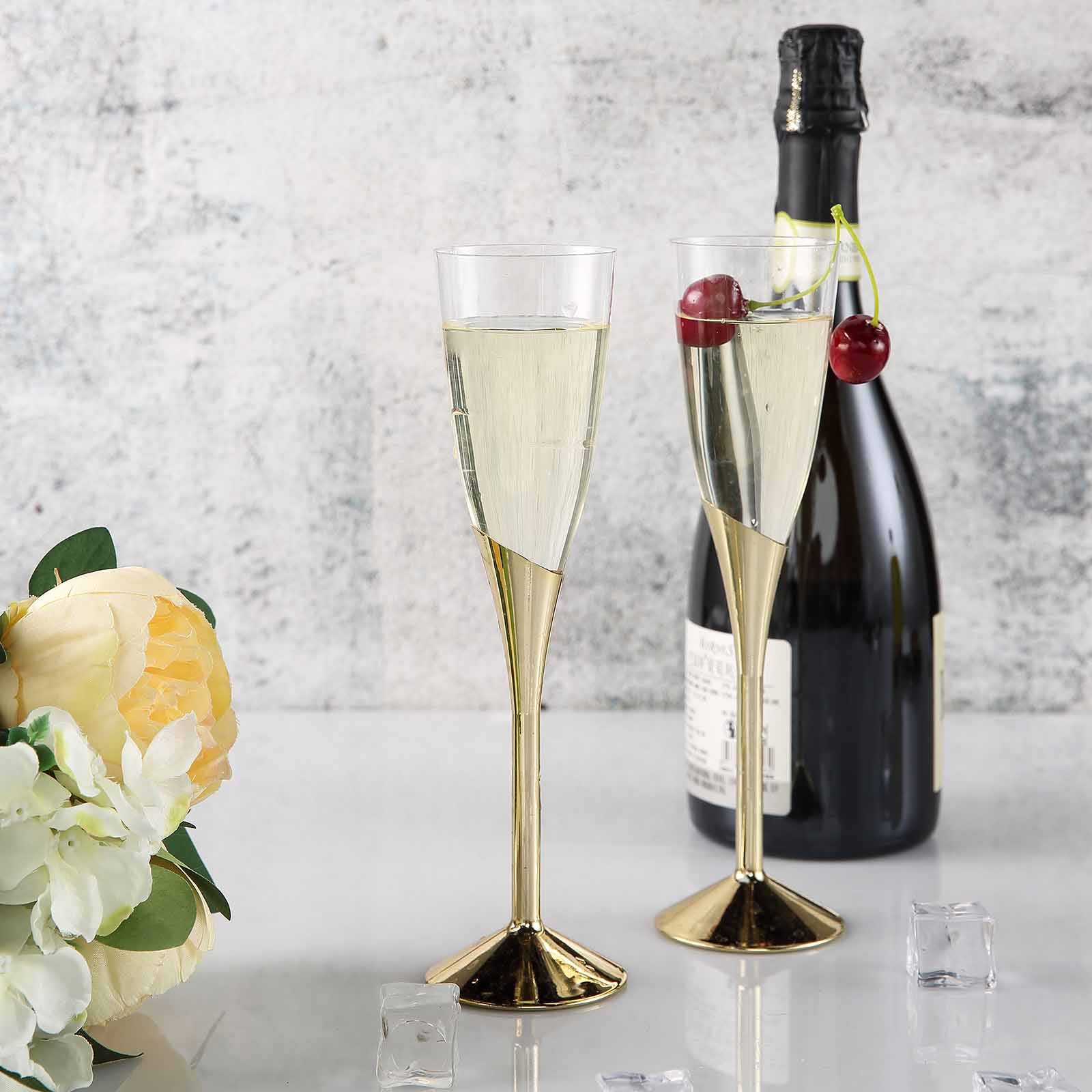 https://www.efavormart.com/cdn/shop/products/Clear-Gold-Plastic-Champagne-Flutes.jpg?v=1704142080