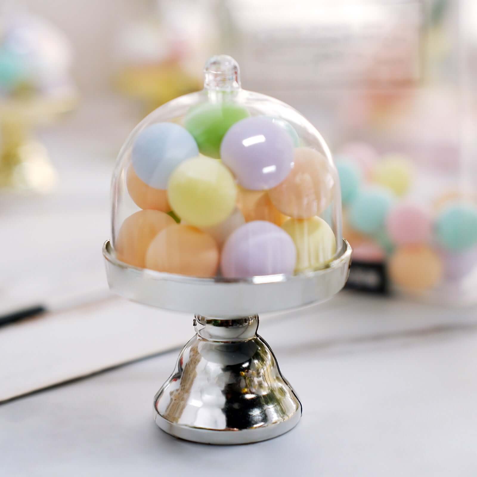 https://www.efavormart.com/cdn/shop/products/Clear-Silver-Fillable-Mini-Pedestal-Cake-Stand-Gift-Boxes.jpg?v=1689407010