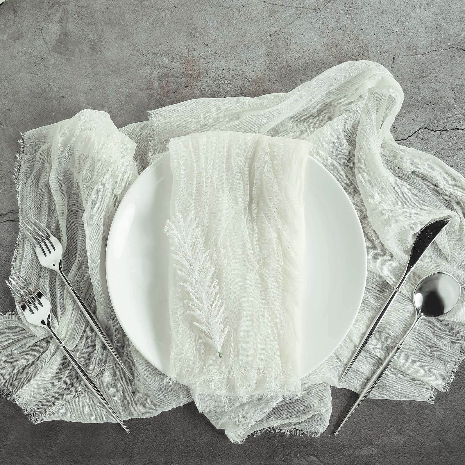 https://www.efavormart.com/cdn/shop/products/Ivory-Gauze-Cheesecloth-Boho-Dinner-Napkins.jpg?v=1689407297