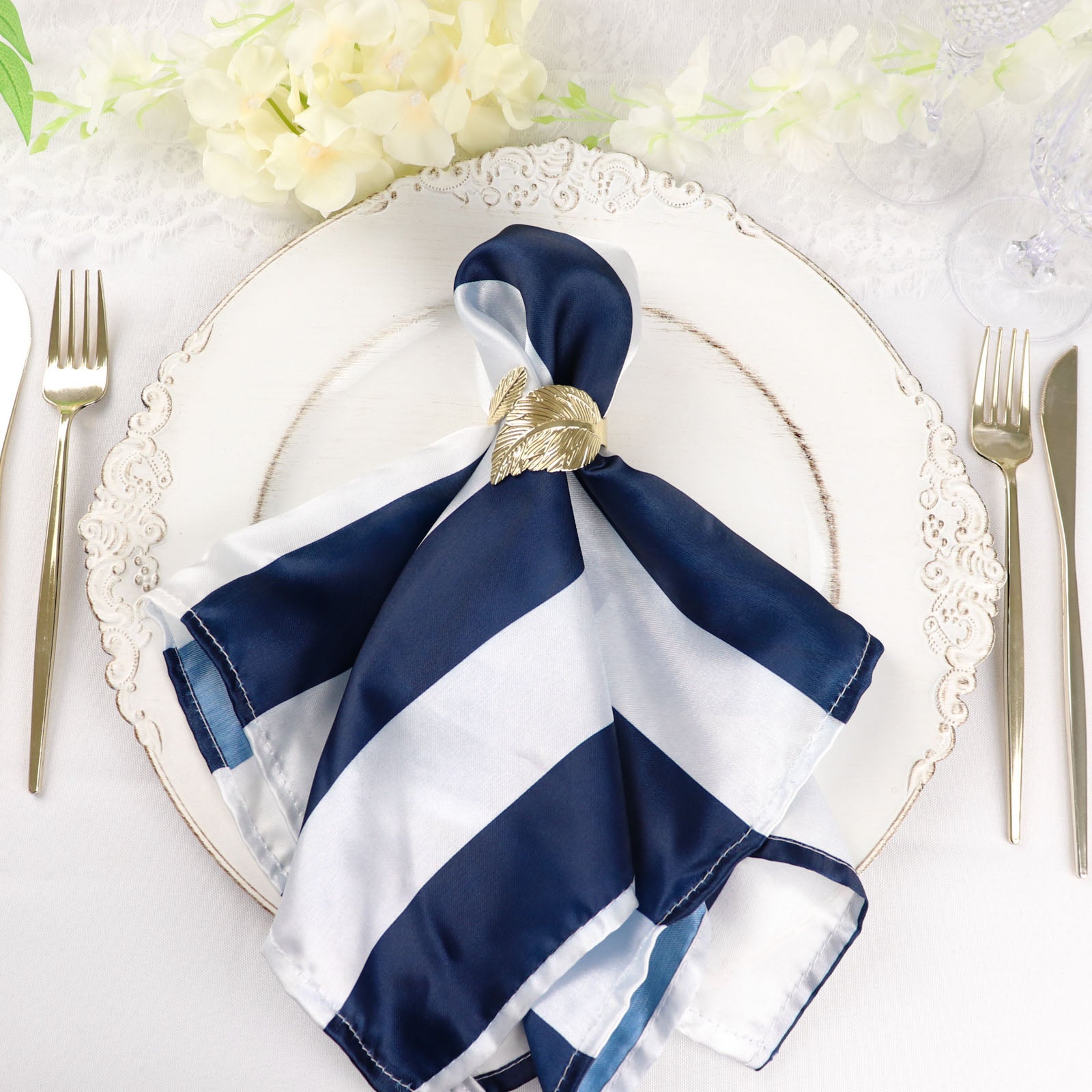 https://www.efavormart.com/cdn/shop/products/Navy-and-White-Striped-Satin-Cloth-Dinner-Napkins.jpg?v=1689406090