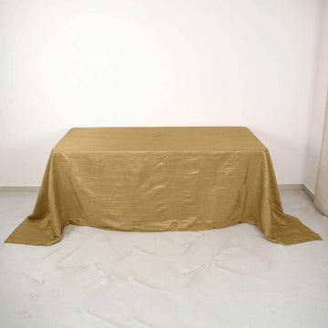 Elevate Your Event with the Gold Accordion Crinkle Taffeta Seamless Rectangular Tablecloth