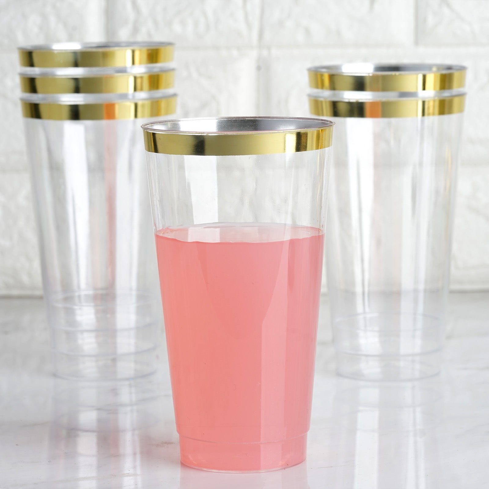 https://www.efavormart.com/cdn/shop/products/Tall-Gold-Rim-Clear-Plastic-Cups.jpg?v=1698163000