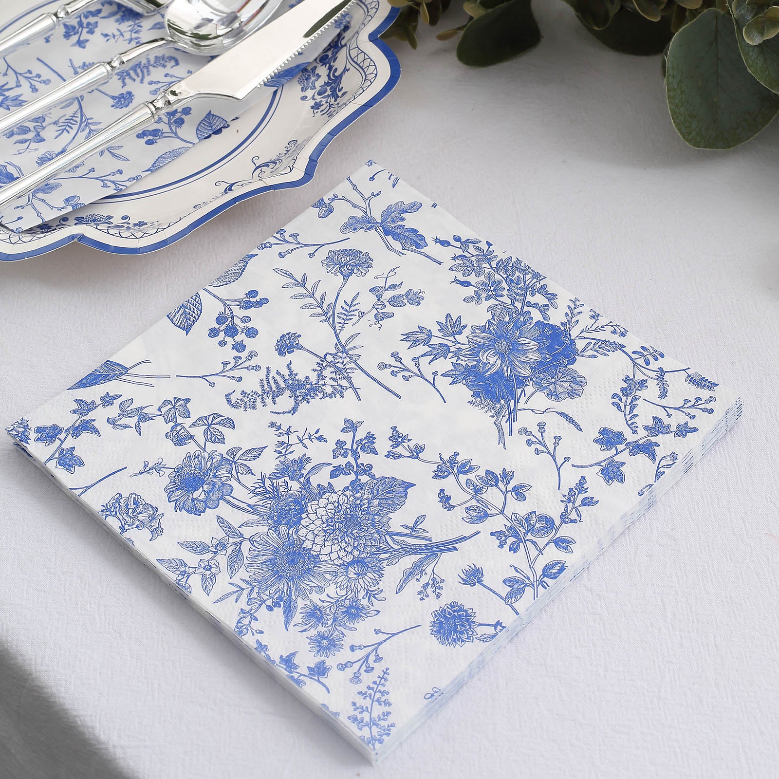 https://www.efavormart.com/cdn/shop/products/White-Blue-Chinoiserie-Floral-Print-Paper-Napkins.jpg?v=1689408351